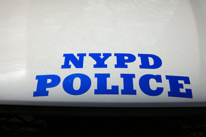 NYPD (New York Police Department) Sign on Police Patrol Car in New York City. USA