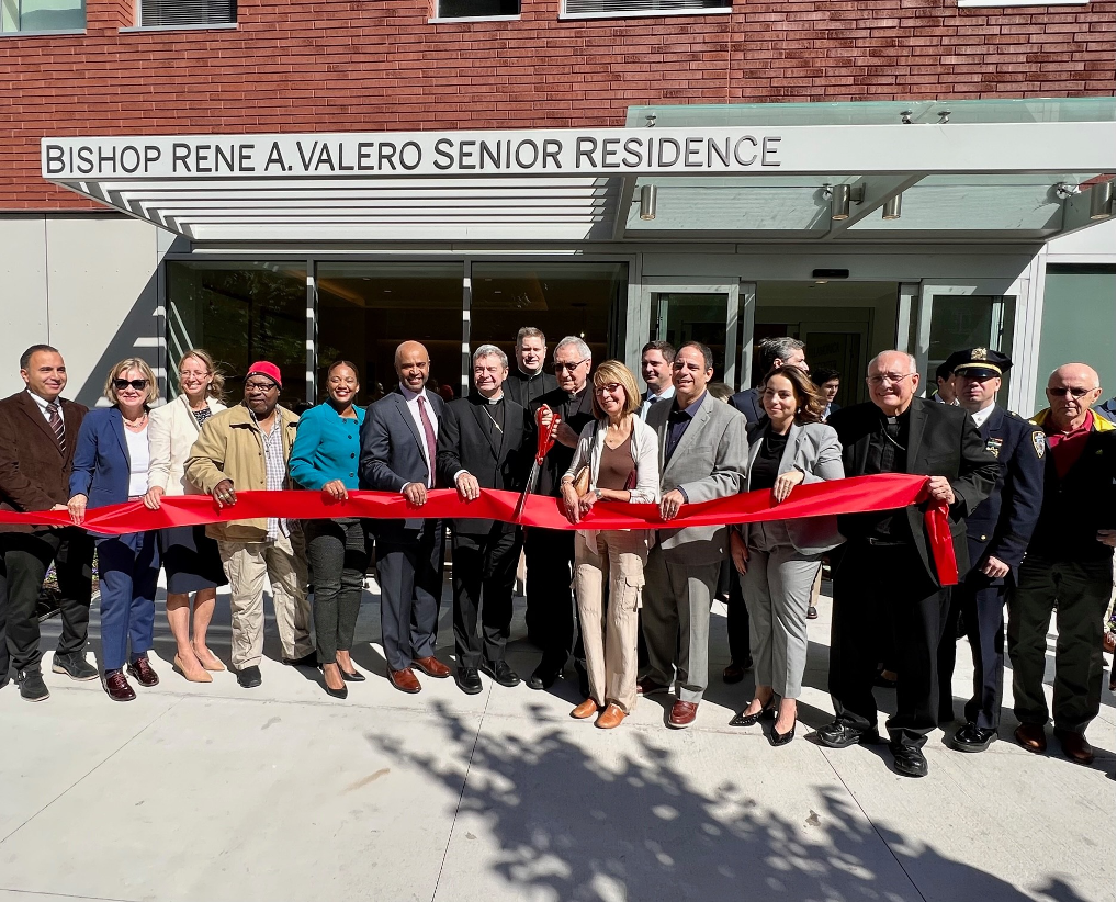 Catholic Charities Brooklyn and Queens officials cut the red ribbon at the new Bishop Rene A. Valero Senior Residence in Astoria