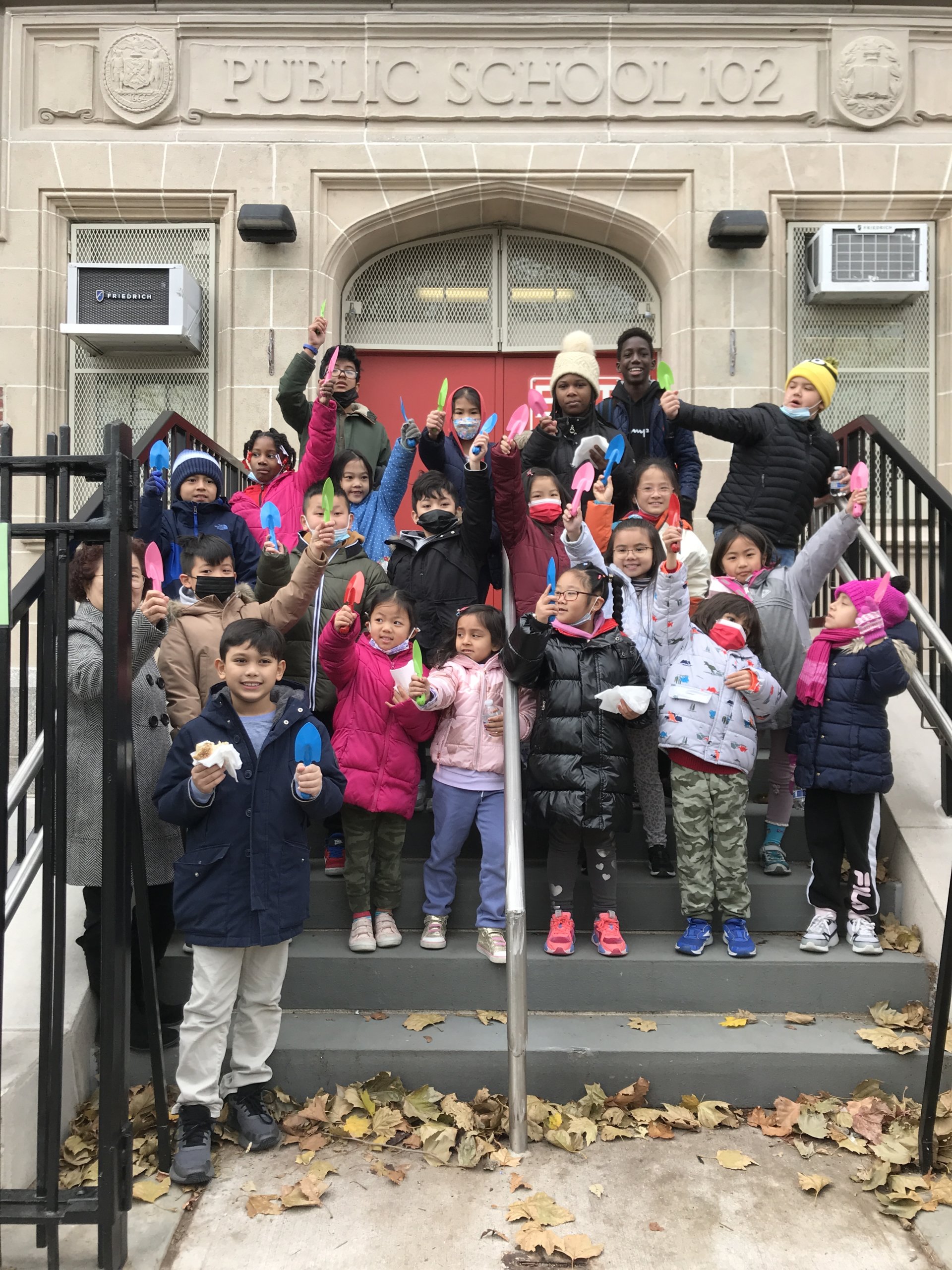 Elmhurst elementary school students plant daffodil bulbs honoring