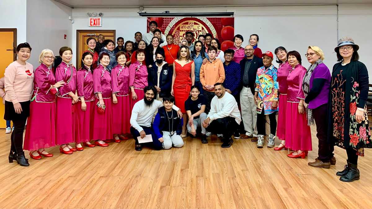 The Cityline Ozone Park Civilian Patrol group and members of the community celebrate Lunar New Year.