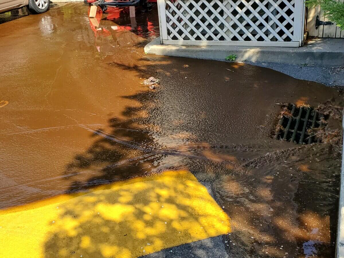 Busted water main at Baybridge Condos fixed after some residents went