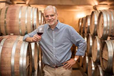 Roman-with-Wine-Glass-and-Barrels-2048×1365
