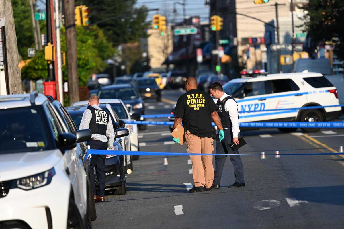 Police investigating after a man was fatally shot in Middle Village.