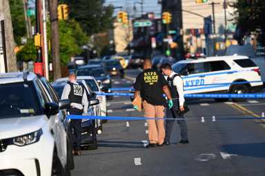 Police investigating after a man was fatally shot in Middle Village.