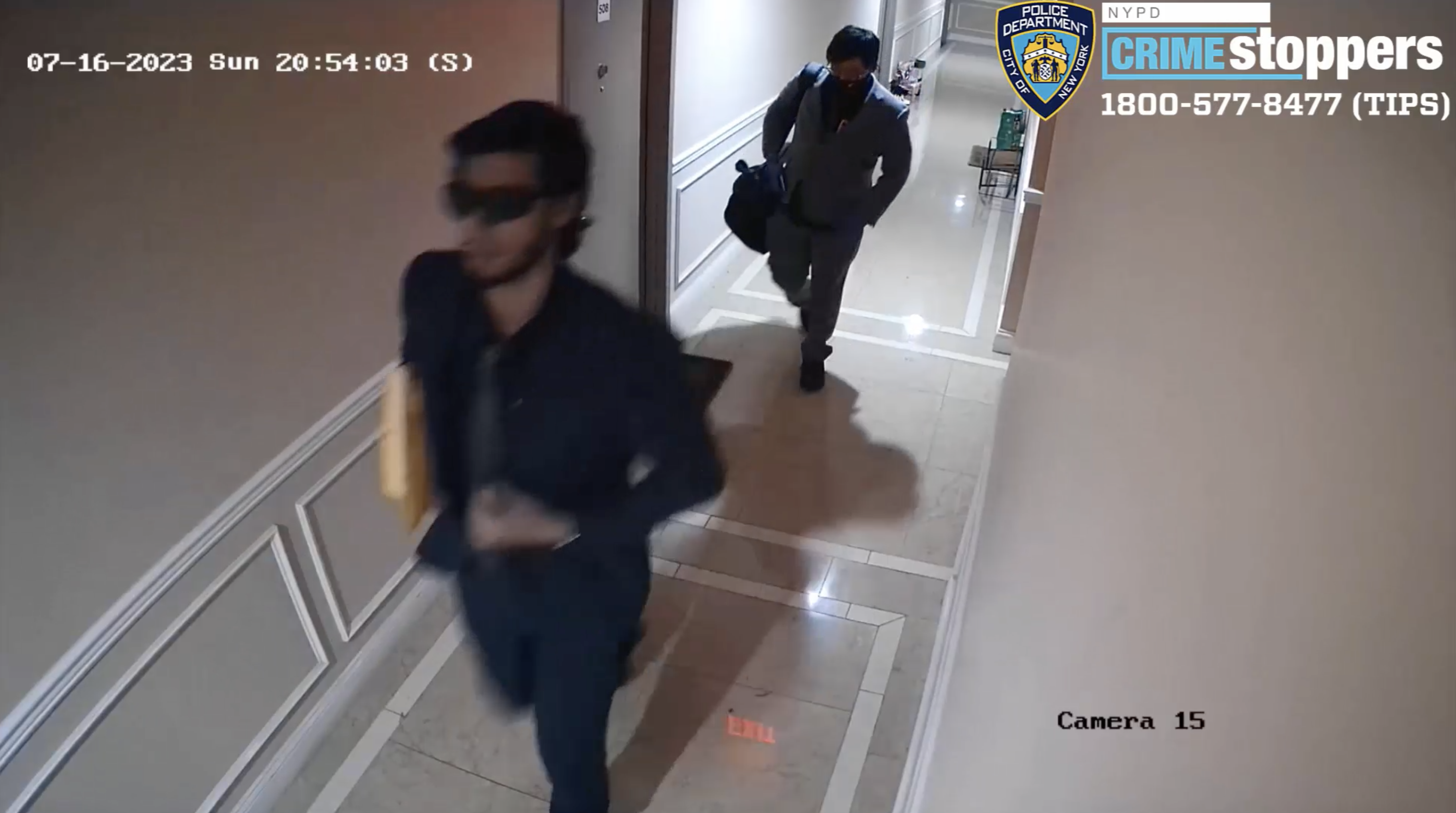 Crooks posed as FBI agents before using Taser to subdue, tie up victims in Flushing home invasion NYPD image