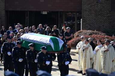 Paul Bears carry the caket of NYPD Crossing Guard Krystyna Naprawa