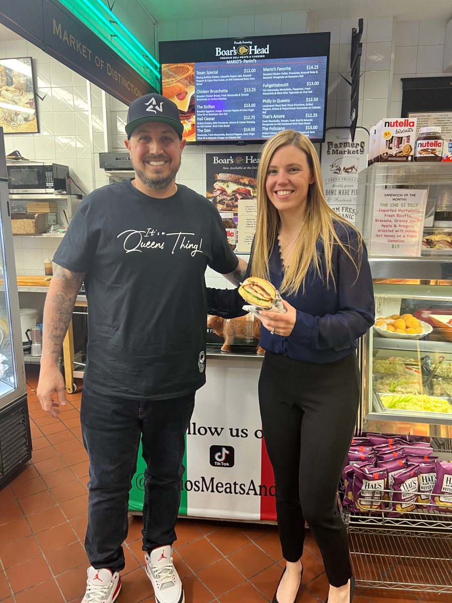 Joe DiGangi with the wife of fallen NYPD Officer Jonathan Diller, Stephanie, at Mario's Meats & Gourmet Deli. 