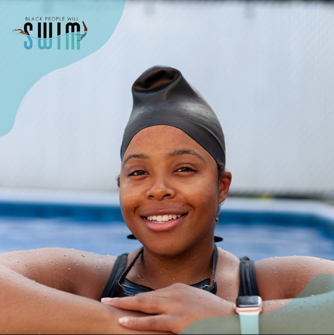 woman in swim cap and bathing suit with arms around the edge of the pool.