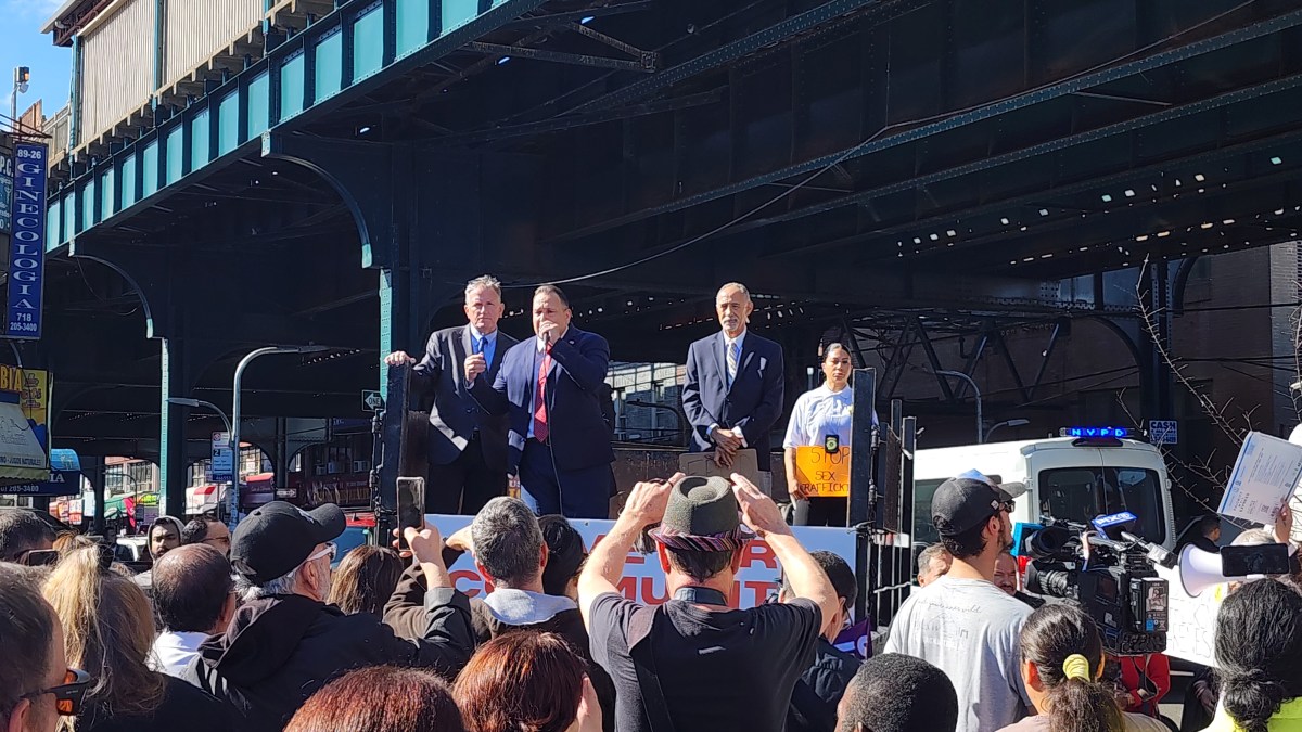 Hiram Monserrate addresses the crowd during Sunday's rally.