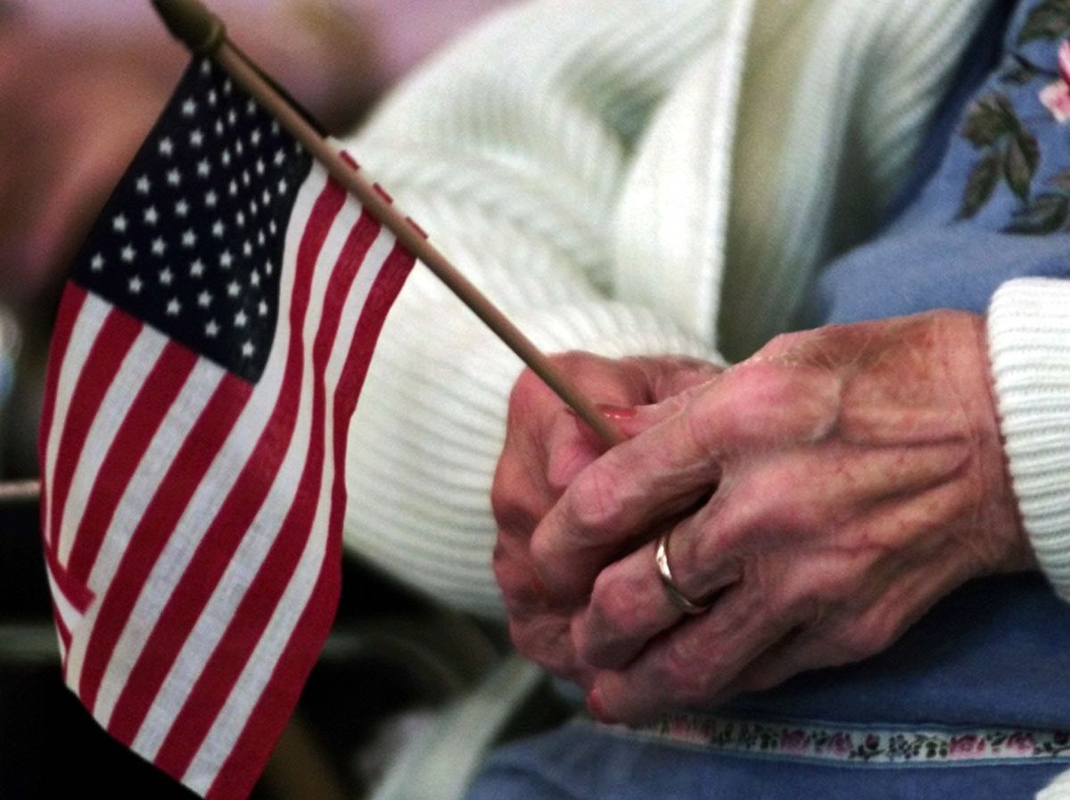 A resident of the Seniorhaven Senior Center holds