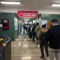 Voters wait in line at P.S. 112 Q in Astoria after ballot scanners malfunction on Election Day.