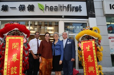 Pat Wang Peggy Sheng Kaushal outside new office