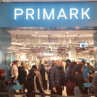 Customers line up at Primark's grand opening at the Queens Center mall on Thursday. Photo: Shane O'Brien