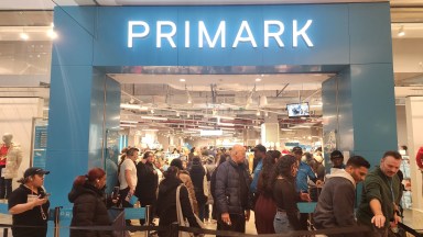 Customers line up at Primark's grand opening at the Queens Center mall on Thursday. Photo: Shane O'Brien