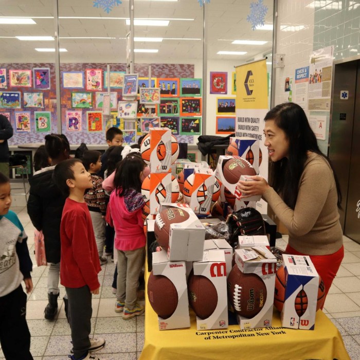 Council Member Sandra Ung hands out toys at PS 24. Photo: Office of Sandra Ung.