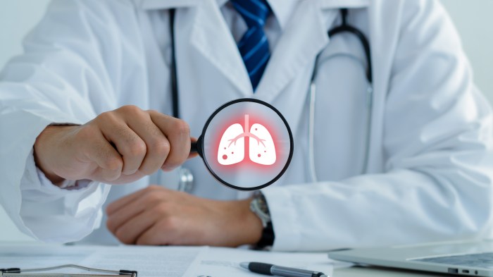 Doctor holding magnifying glass to checkup lung health,respiratory disease,lung cancer,bronchitis,Bronchial Asthma,Tuberculosis,pneumonia,asthma,air pollution pm2.5 concept.world no tobacco day.