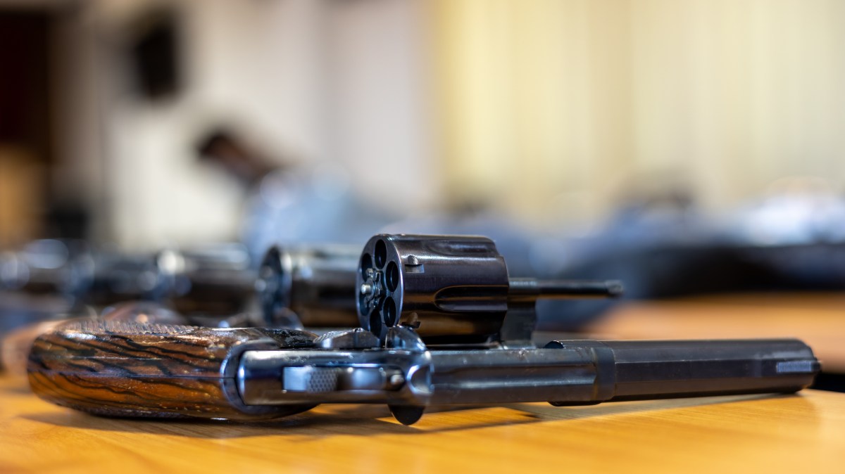 Off-duty cop assigned to the 104th Precinct in Ridgewood was busted after a search of his Laurelton home found 15 unregistered firearms,