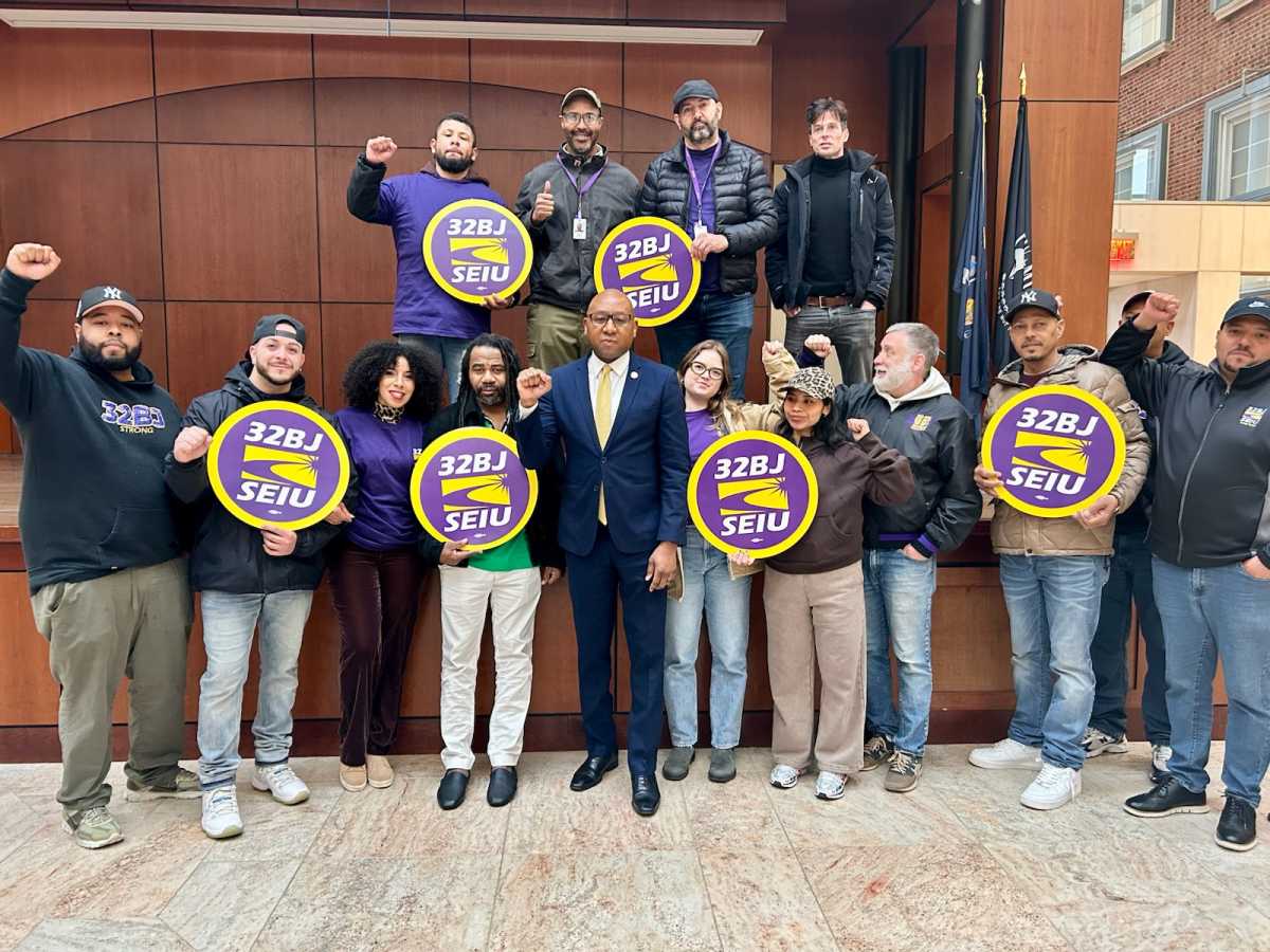 Queens Borough President Donovan Richards and members of 32BJ SEIU at Queens Borough Hall Monday morning to protest against a proposed rise in Con Edison prices.