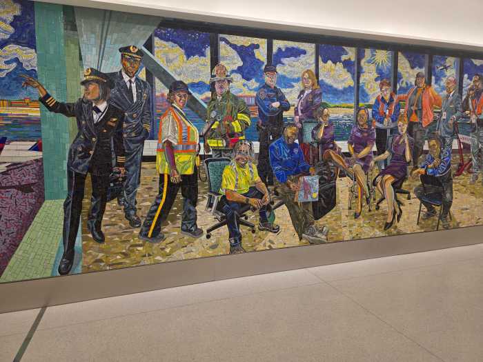 Nizenbaum's mural at Terminal C pays tribute to airport workers. Photo: Shane O'Brien