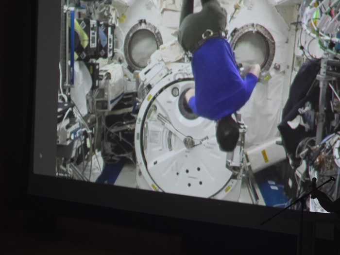 Kim performs a backflip to demonstrate the effects of microgravity on board the ISS. Photo: Shane O'Brien. 