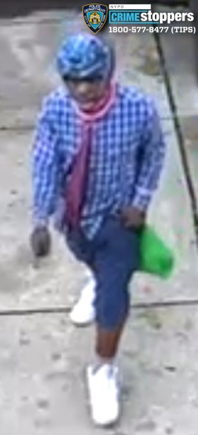 A strange-looking burglar allegedly broke into a Woodside home but was confronted by an elderly resident and made a clumsy escape.