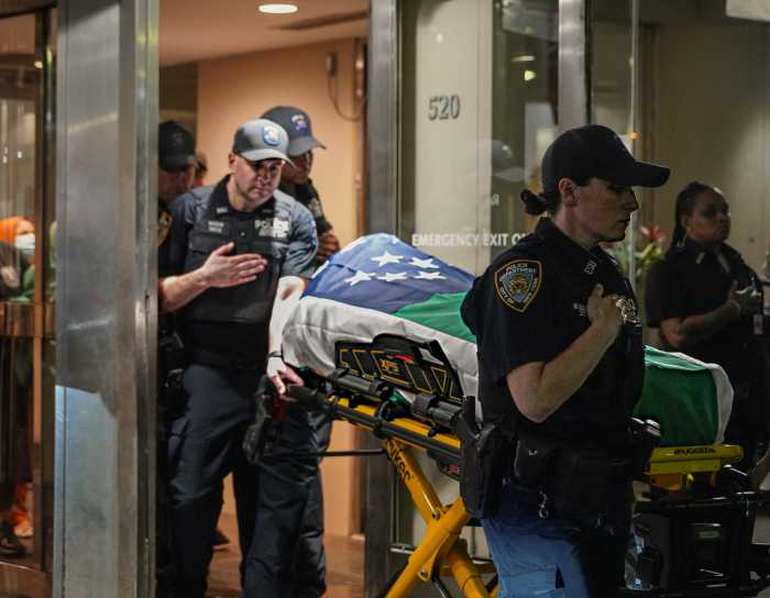 The body of the NYPD officer killed during Monday’s mass shooting in Midtown was transferred from the hospital to the Chief Medical Examiner overnight in a dignified transfer.