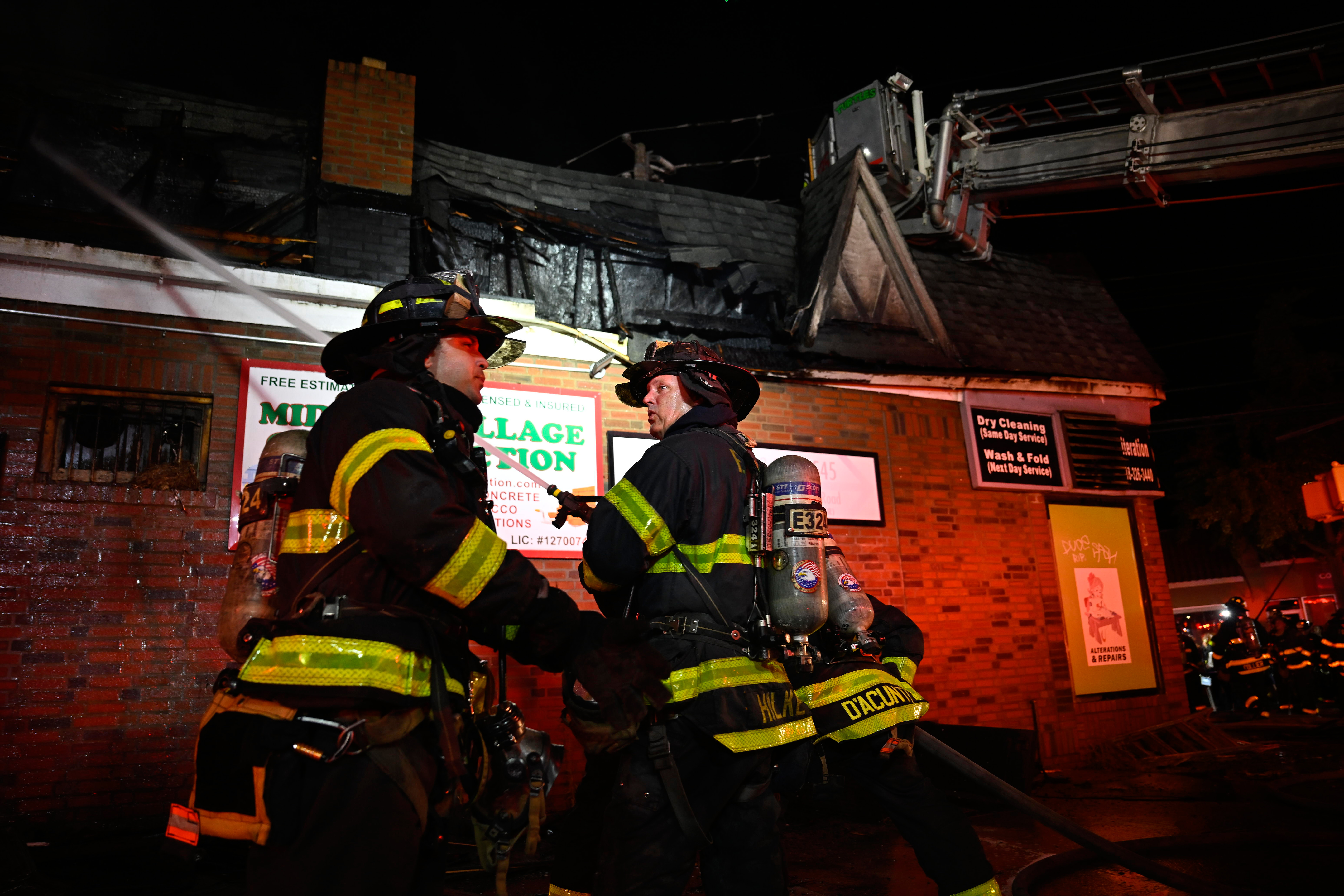 The FDNY battled a ferocious four alarm fire that ripped through seven one-story commercial buildings on Dry Harbor Road in Middle Village on July 28.