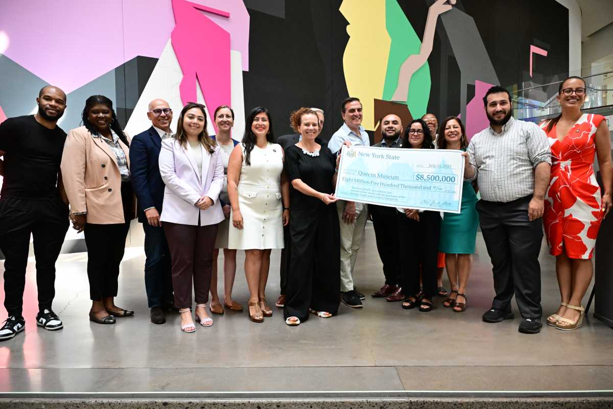 Queens lawmakers present the Queens Museum with a check for $8.5 million. Photo Ramy Mahmoud/QNS