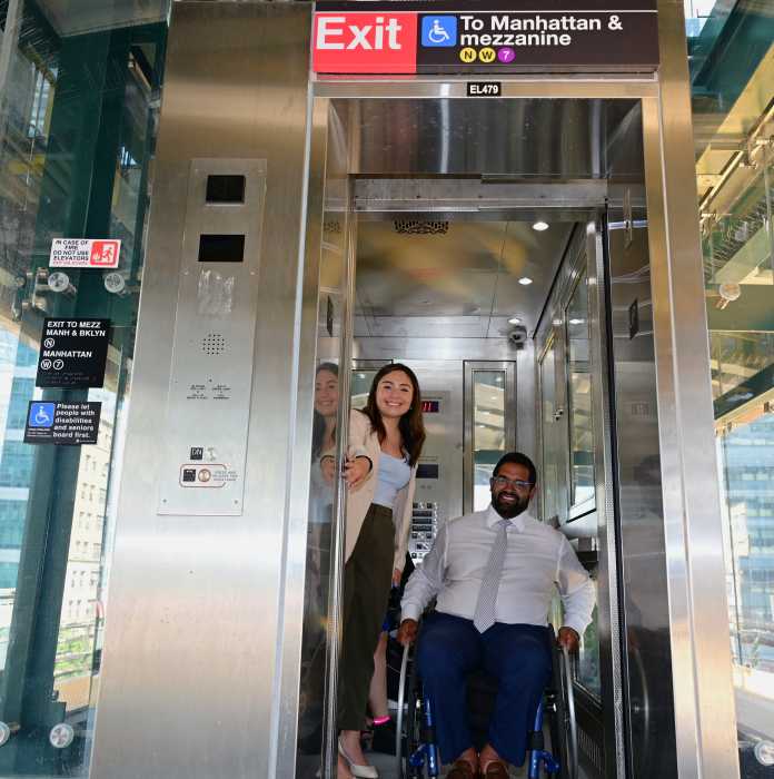 Gonzalez and MTA Chief Accessibility Officer Quemuel Arroyo use a newly-installed elevator at Queensboro Plaza. Photo Ramy Mahmoud.