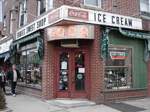 The storefront of Eddie's Sweet Shop, a sweet neighborhood staple, in Forest Hills.