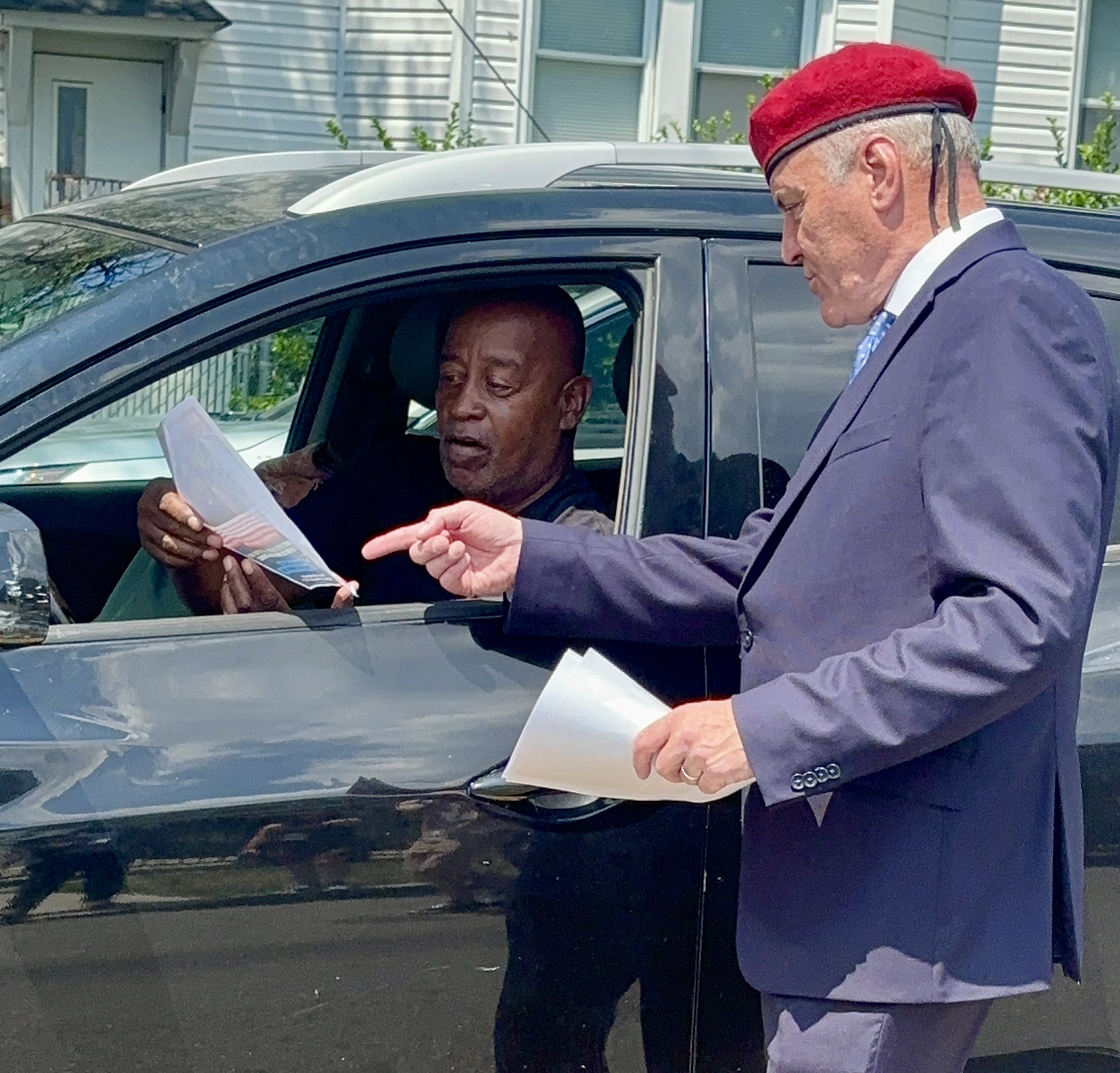 Curtis Sliwa held a press conference right at the scene of the crime and then went door-to-door and car-to-car, speaking with residents and handing out flyers that showed an image of the suspect.