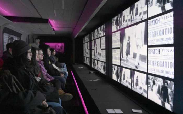 Students at the Mobile Museum of Tolerance. Photo courtesy of Pollack Group.