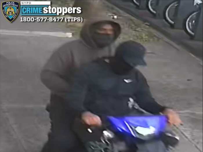 Cops are looking for these suspects who allegedly robbed a motorist at gunpoint in Corona.
