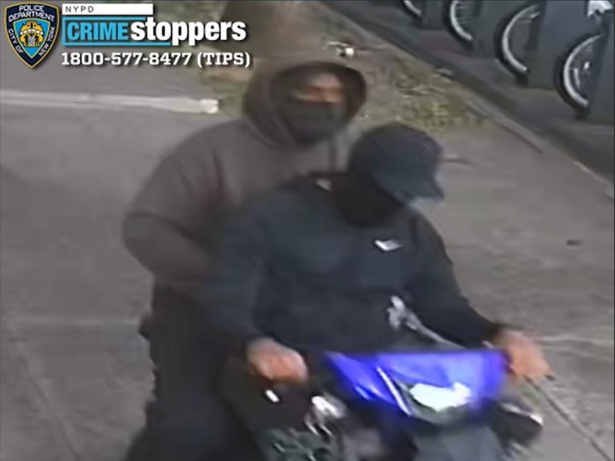 Cops are looking for these suspects who allegedly robbed a motorist at gunpoint in Corona.