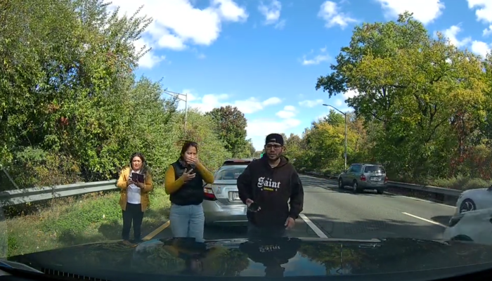 Two Brooklyn men are charged with staging a motor vehicle accident for orchestrating this notorious 2024 crash on the Belt Parkway in Rosedale after several scammers were caught on the victim's dashcam, which was posted to TikTok, where it was viewed by millions worldwide.