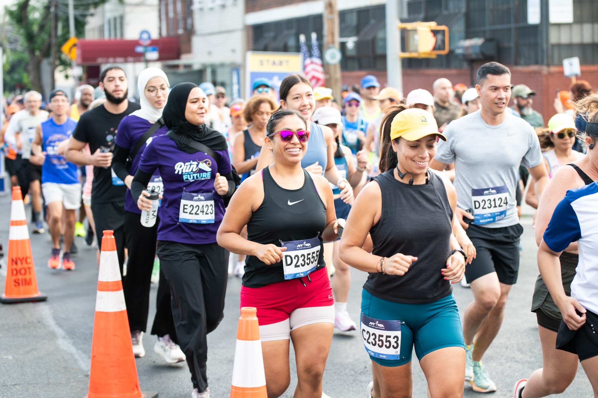 A crowd of runners smiled as they sprinted down Vernon Boulevard at the inaugural NYRR Start Line Series run in Long Island City.