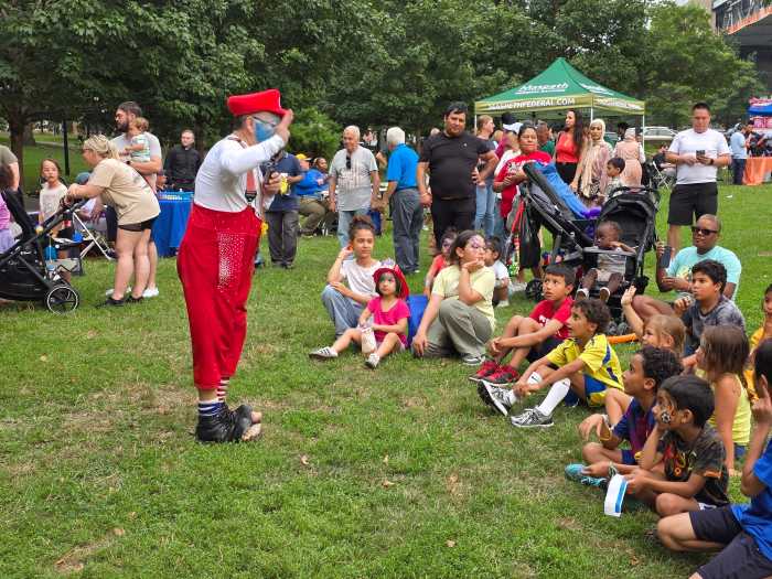 Paquito the Clown entertains guests at Astoria Park. Photo: Shane O'Brien. 