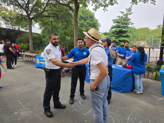Captain Hameed Armani meets local residents during National Night Out. Photo: Shane O'Brien.