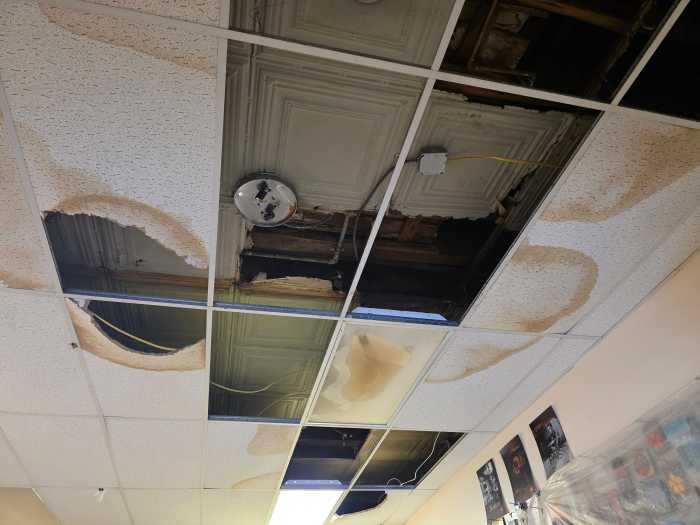 A number of tiles have fallen from the ceiling of the Long Island Drum Center. Photo: Shane O'Brien