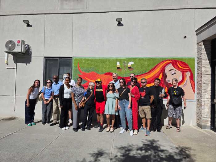 Rodriguez joins members of the local community at Wednesday's unveiling. Photo: Shane O'Brien. 
