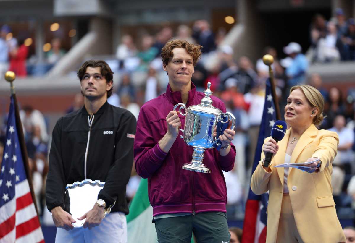 Flushing Meadows, New York, United States - September 8, 2024 Taylor Fritz watches on as Italy's Jannik Sinner celebrates with the US Open trophy. REUTERS/Mike Segar