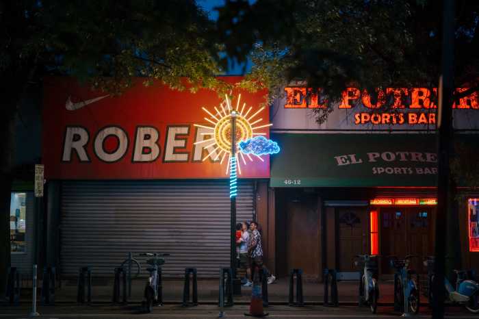 The lighting initiative features sun designs that aim to make the Greenpoint Avenue corridor safer. Photo: Cameron Blaylock.