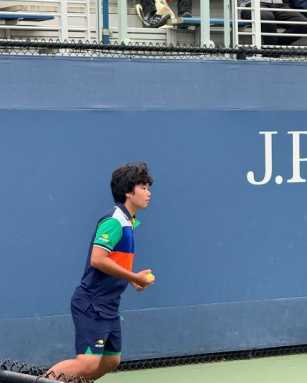 New York Junior Tennis & Learning member Kento Smith works as a ball crew member at the 2025 US Open. Photo courtesy of NYJTL.