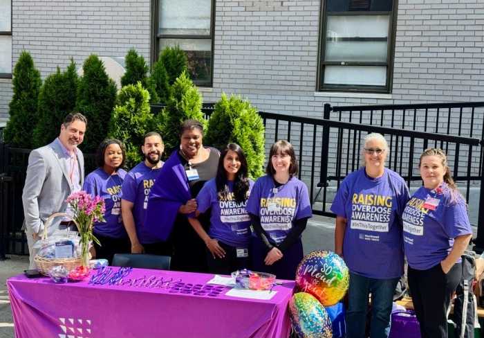 Dr. Christopher Calandrella and staff at Long Island Jewish Forest Hills distribute free NARCAN overdose rescue kits on Thursday, ahead of International Overdose Awareness Day.