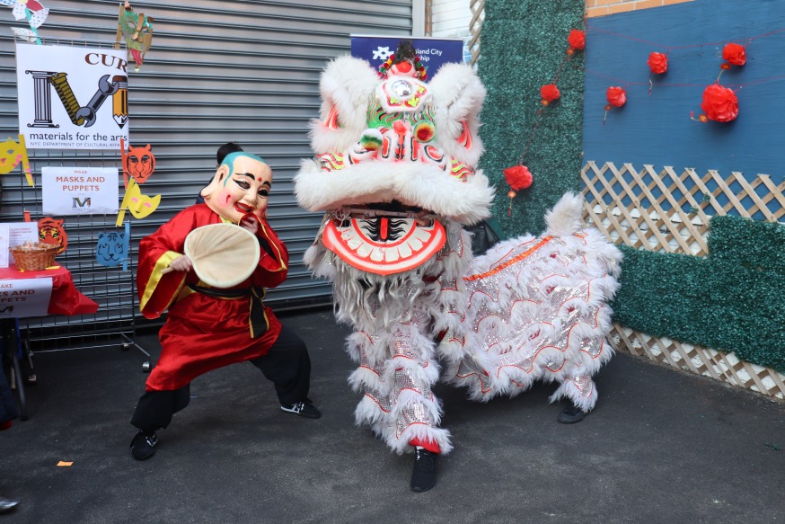 Buddha and a tiger (Photo by Michael Dorgan, Queens Post)