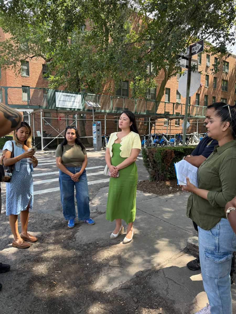 Council Member Julie Won participates in a neighborhood walkthrough after reportedly receiving multiple complaints of rat infestations linked to a Phipps development in Sunnyside.