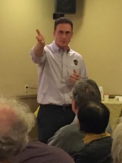 Travis Terry of Friends of the Queensway speaks to residents at the Forest Hills Civic Association meeting Tuesday night. Photo by Domenick Rafter