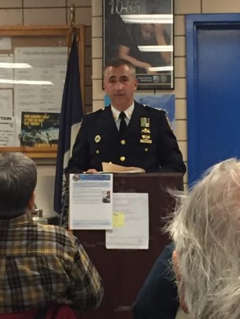 Captain Robert Ramos, commanding officer of the 112th Precinct, speaks at the precinct's community council meeting Wednesday. Photo by Domenick Rafter