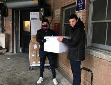 Moya-and-Krane-surgical-mask-donation-to-Elmhurst-Hospital