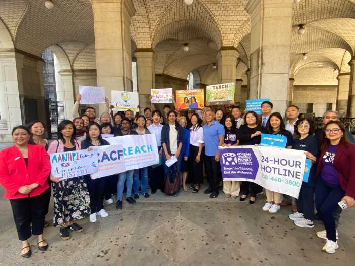 State Sen. John Liu, Assembly Member Grace Lee and members of the R.E.A.C.H coalition at Wednesday's rally calling on Gov. Kathy Hochul to sign the AANHPI Education Equity Act into law. Photo courtesy of State Sen. John Liu.